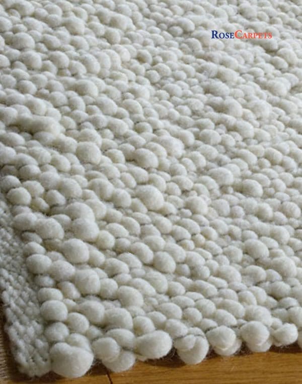Tappeto su misura intrecciato in lana